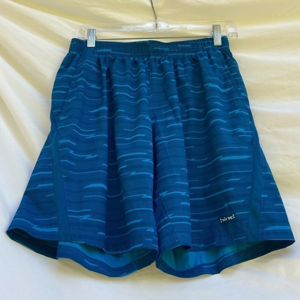 Hind blue swim trunks with pockets, size small